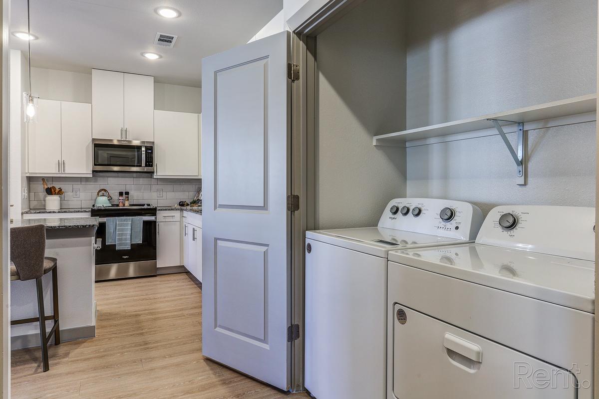 In-home laundry space with washer and dryer included