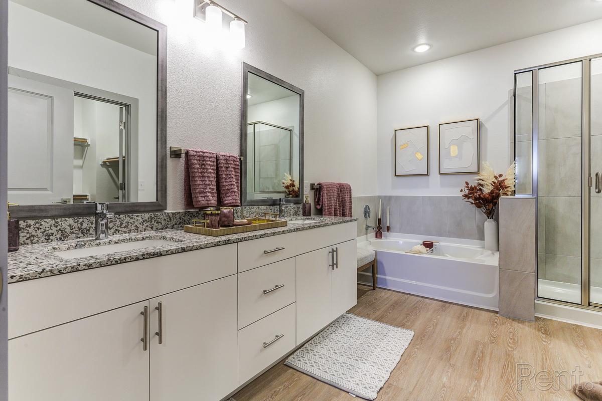Apartment bathroom with vanity and tub-shower